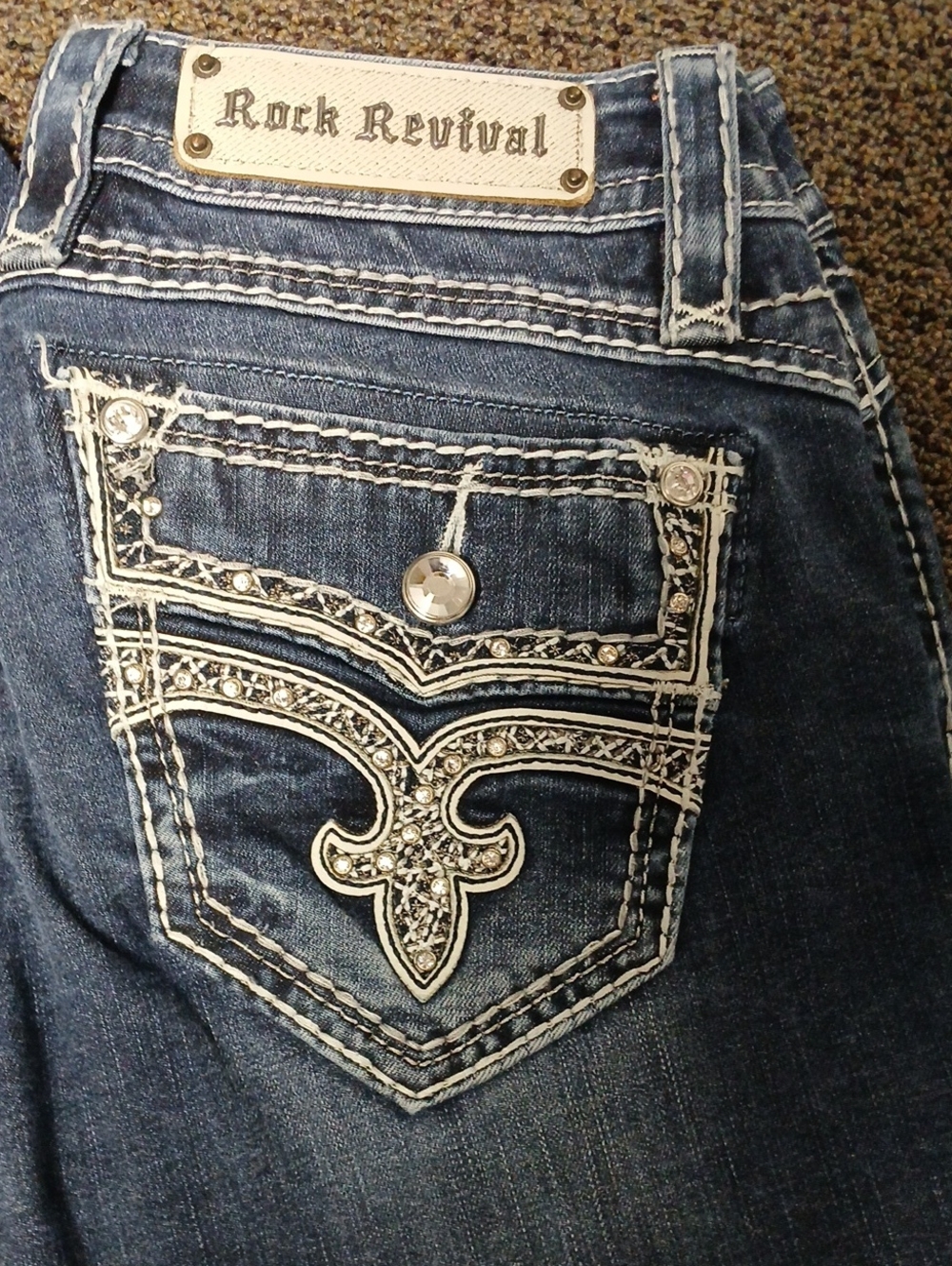 Rock Revival Women's Dark Blue Jeans with Rhinestone Embellished Pocket